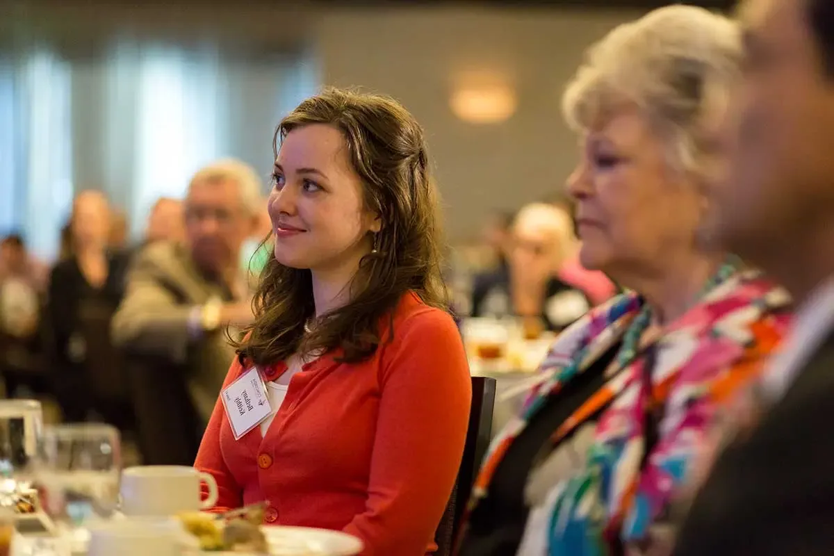 Attendees at their tables